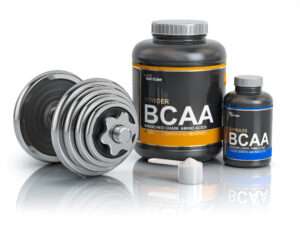 Depositphotos 221120274 l 2015 300x225 - BCAA  branched-chain amino acid with scoop and dumbbell.Bodybuil